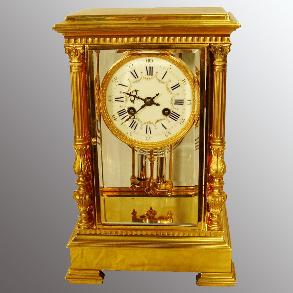 Gold plated 4 glass clock Antique Clocks